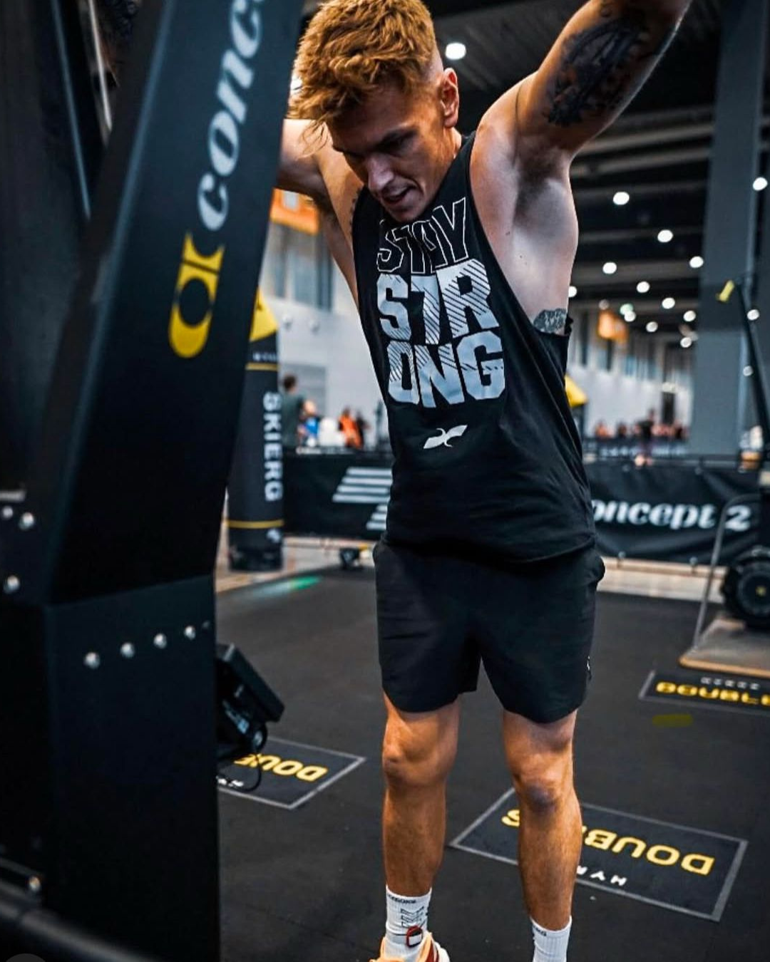 Ciaran Parkinson on a ski erg competing at a hyrox event