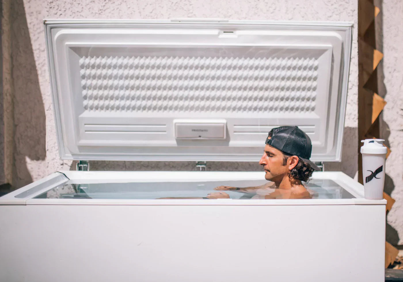 Ice bath picture of man in chest freezer