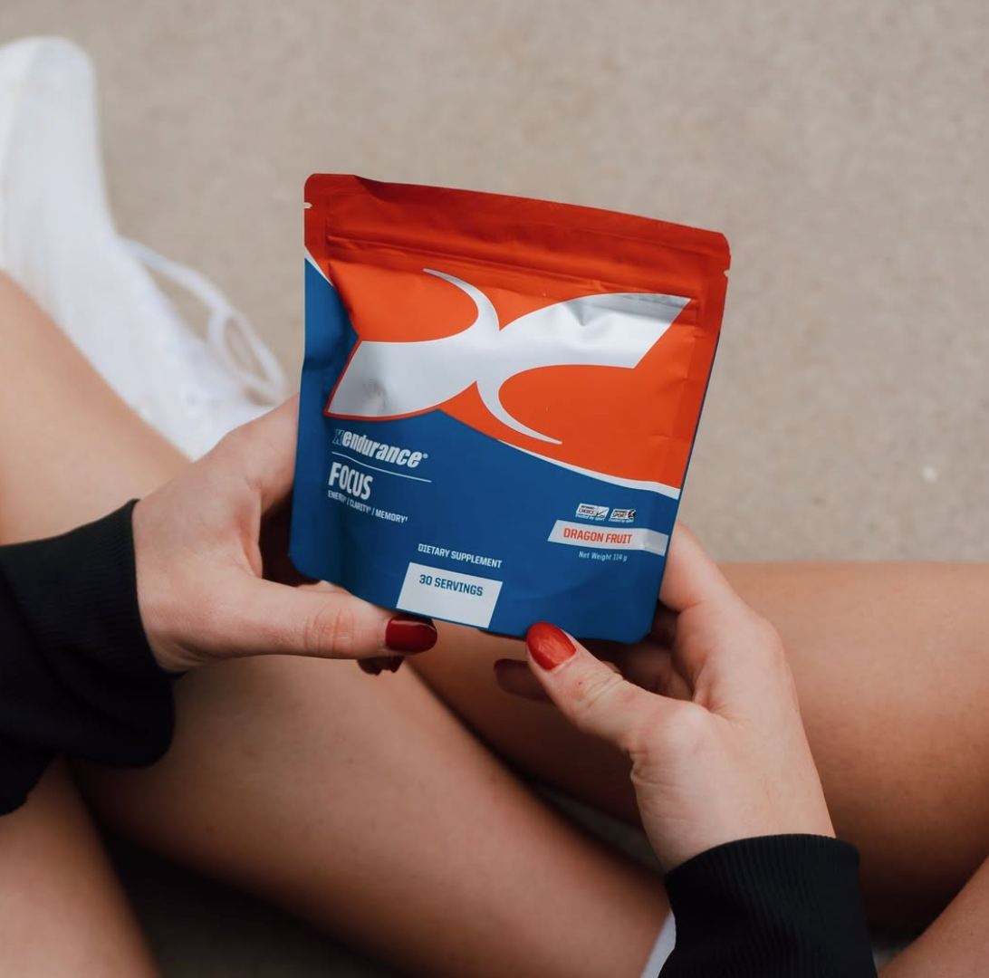 Picture of Hyrox athlete holding a packet of Xendurance Focus